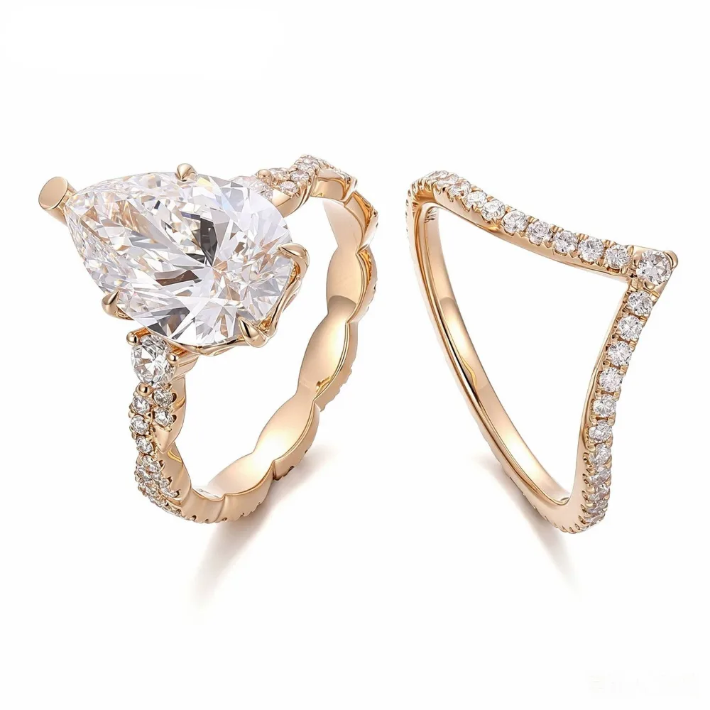 A pear-cut diamond engagement ring and shaped band
